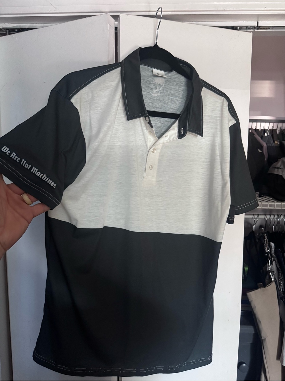 We Are Not Machines Men's Two-Tone Black and White Polo Shirt